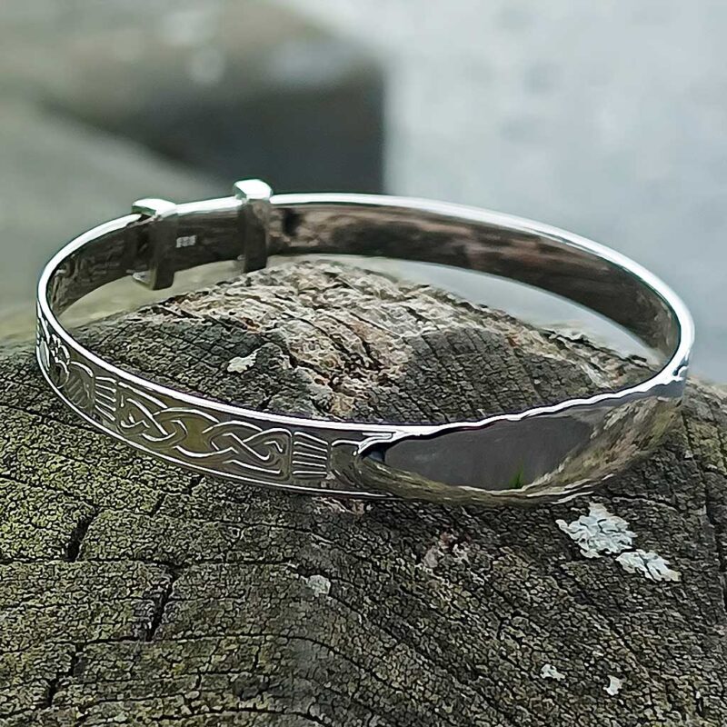 Personalised Claddagh Christening Bangle In Sterling Silver. Irish Christening Baby Bangle with Celtic Claddagh Design. Free Engraving, Dublin Castle Hallmark, complimentary jewellers box & optional gift wrapping. Tracked Delivery.