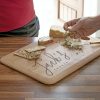 Personalised Cheeseboard in Beech Wood. Laser engraved script font Name Personalised Cheeseboard with Integrated handle in FSC Certified Beech Wood.