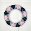 Handmade Sweater Style Wreath. Christmas & Home Wreath decorated with fluffy yarn and felt in three winter colours - grey, dark blue and pink.