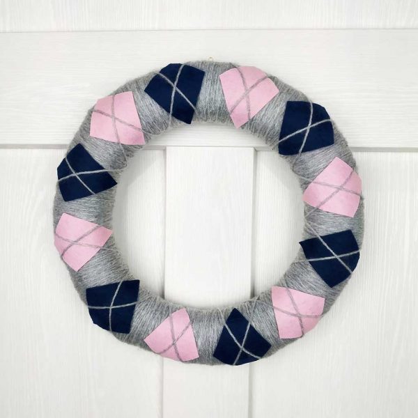 Handmade Sweater Style Wreath. Christmas & Home Wreath decorated with fluffy yarn and felt in three winter colours - grey, dark blue and pink.