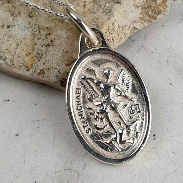 Saint Michael and Guardian Angel Silver Medal Pendant on 18inch silver chain. Faith jewellery featuring St Michael on the front and Guardian Angel on back.