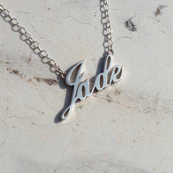Personalised Name Necklace Handmade To Order in Sterling Silver on 20" Silver Chain that simply Oozes Quality with its Beautifully Polished External Edges & Smooth Curves. Commission your Name Pendant with up to 8 Letters.