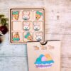 Easter Tic Tac Toe Game With Box Lid is a fun Easter Game & Home Decoration for Kids, Children & Family. Handmade in Ireland. Choose from 8 Colourful Designs.