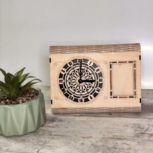 Wooden table clock & photo frame handmade home decor. Timepiece and cherished memory photo display. Photo Size: 6x7 cm, Size: 20x16 cm. Made in Ireland.