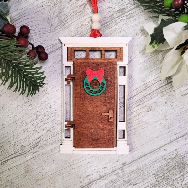 Personalised Christmas Tree Decoration with Opening Front Door. Choose from 3 door designs & 6 heartfelt inscriptions inside. Handmade in Ireland to order.