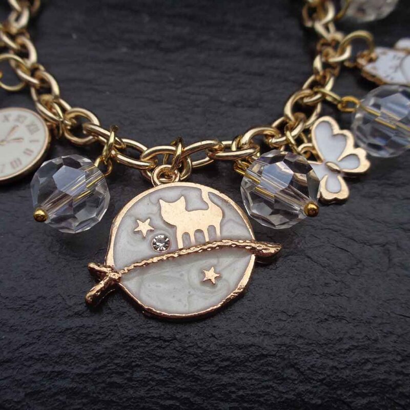 Cat Charm Bracelet: Celebrate your love for cats with our handcrafted Cat Charm Bracelet! White glass beads & adorable cat charms on a gold chain. Perfect gift for cat lovers!