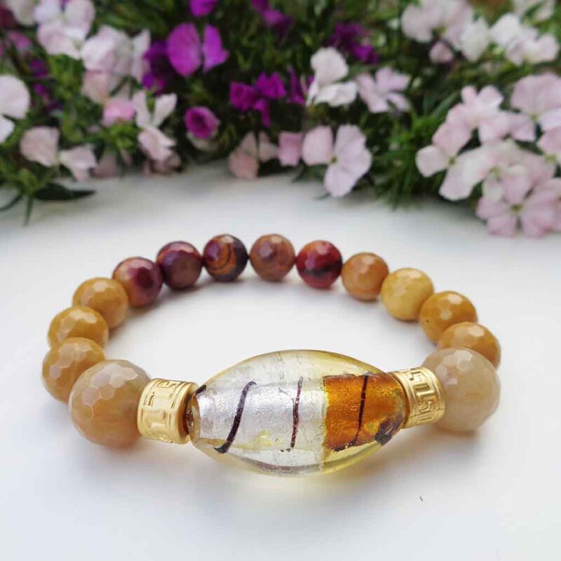 Handmade Gemstone Bracelet: Mookaite Jasper gemstone beads meet a captivating vintage lampwork glass bead in this bohemian Gemstone Bracelet. Handcrafted bracelet with earthy tones. Shipped worldwide from Ireland.
