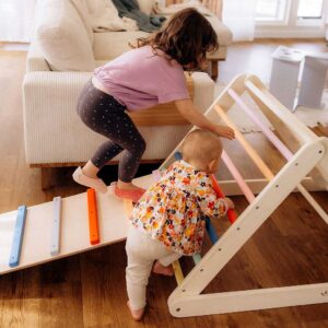 Adjustable Colourful Climbing Triangle with Climbing Ladder ramp for toddlers to boost balance & confidence. Rainbow & wood, optional slide & climbing ramp. Tracked delivery Ireland & EU