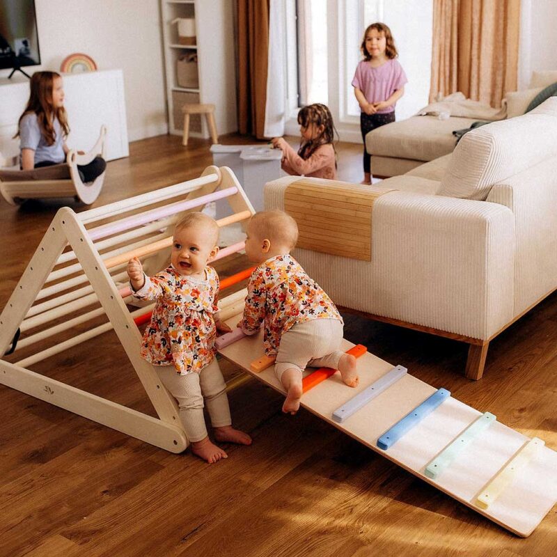 Adjustable Colourful Climbing Triangle with Climbing Ladder ramp for toddlers to boost balance & confidence. Rainbow & wood, optional slide & climbing ramp. Tracked delivery Ireland & EU