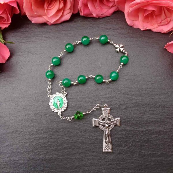 Handcrafted Irish jade rosary with 10 natural jade beads and a detailed Celtic cross. Elegant, spiritual, and perfect as a meaningful gift.