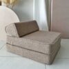 A cosy 3-in-1 foam armchair, lounger & play spot for children. Made with soft Beige bouclé. Machine-washable & eco-friendly. Ireland & EU ShopStreet.ie