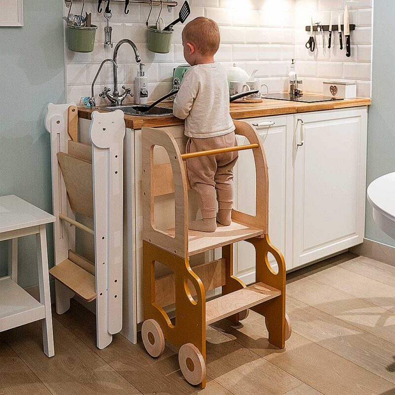 Montessori Yellow Car Kitchen Helper – transforms into a kids’ table & chair. Handmade, space-saving design for play, learning & helping. Engraved & delivered with tracking.