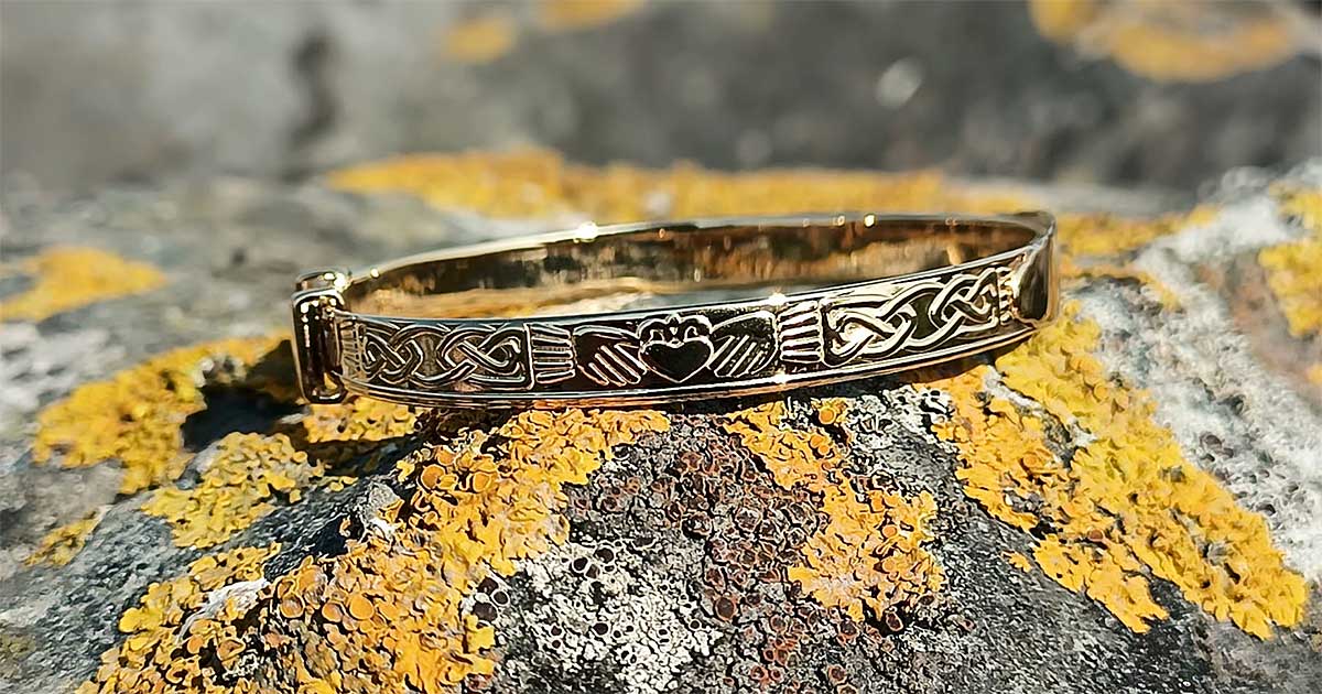 Handcrafted gold-plated Claddagh bangle for newborn, new baby or Christening gift with tracked shipping, optional gift box and wrapping from Irish family Jeweller