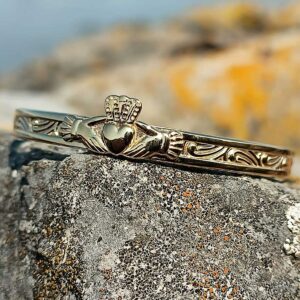 Handcrafted gold-plated Claddagh baby bangle, perfect for newborns, Christening or new baby gifts. Ships with tracked delivery and optional gift box & wrapping from Irish family jewellers.