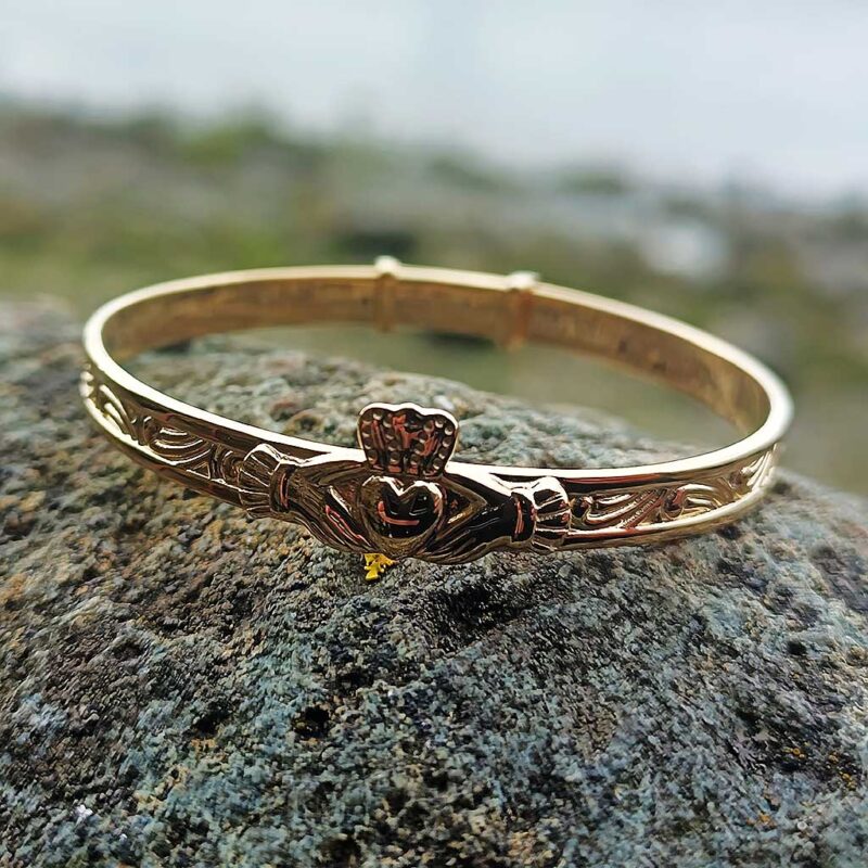 Gold-plated Claddagh Christening Baby Bangle in hallmarked sterling silver. Handmade by Irish jewellers, supplied gift-ready in complimentary box with tracked An Post delivery.