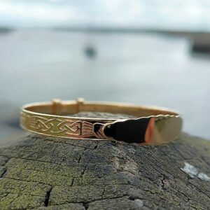 Personalised gold-plated silver Claddagh Baby Bangle, hallmarked at Dublin Castle, with free engraving. Gift-ready with box, optional wrapping, and tracked delivery.