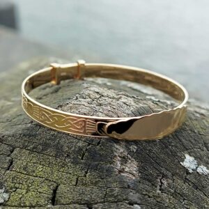 Engraved Claddagh Baby Name Bangle in gold-plated silver. Hallmarked at Dublin Castle, handmade by Irish family jewellers, gift-ready with optional wrapping and tracked delivery.