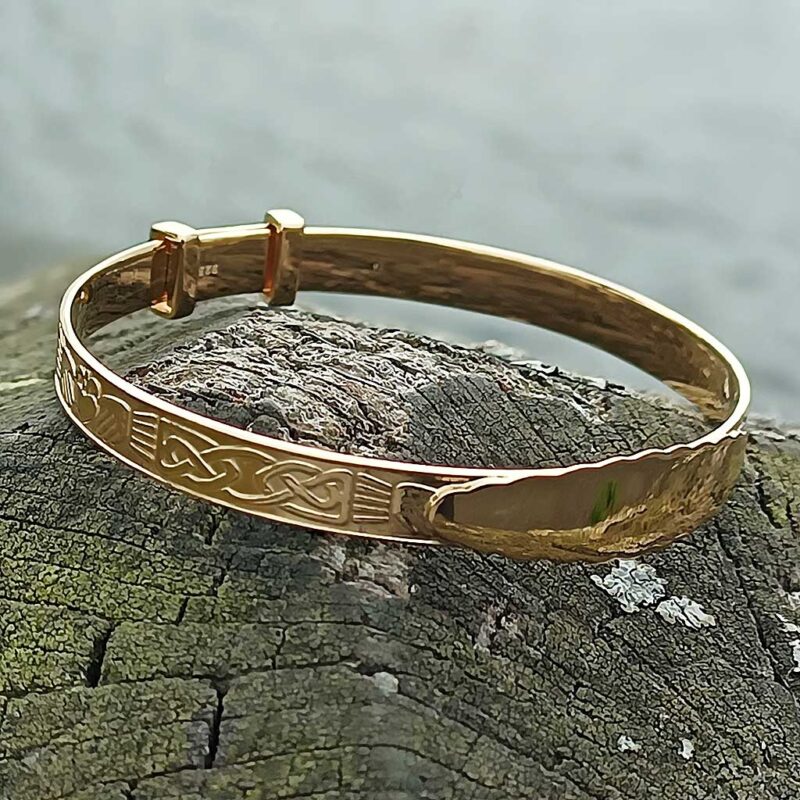 Irish Claddagh Baby Name Bangle, gold-plated silver, hallmarked at Dublin Castle. Free engraving included, gift-ready with complimentary jewellers box and tracked shipping from Ireland.