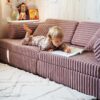 Light Pink Modular Waffle Corduroy Play Sofa for kids. Handmade 10-part design, durable & cosy for playrooms & nurseries. Delivered in Ireland & EU.