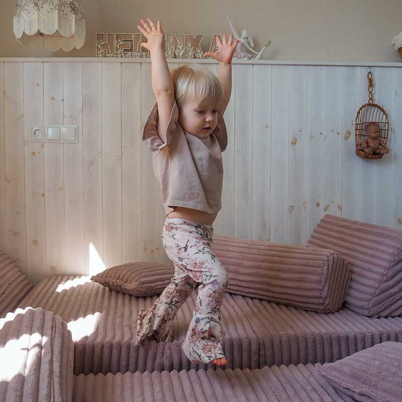 Light Pink Modular Waffle Corduroy Play Sofa for kids. Handmade 10-part design, durable & cosy for playrooms & nurseries. Delivered in Ireland & EU.