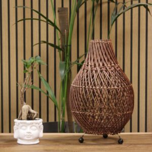Rattan table lamp in brown weave. Creates warm ambient light for bedrooms and living spaces. Supplied with bulb. Ireland delivery.