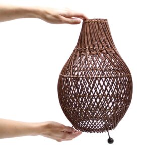 Rattan table lamp in brown weave. Creates warm ambient light for bedrooms and living spaces. Supplied with bulb. Ireland delivery.