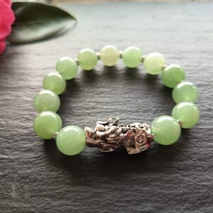 A beautiful 12mm green aventurine bracelet featuring a detailed Pixiu centerpiece—symbolizing wealth, protection, and good fortune. A meaningful and stylish piece for everyday wear. Handmade In Ireland with tracked An Post delivery.