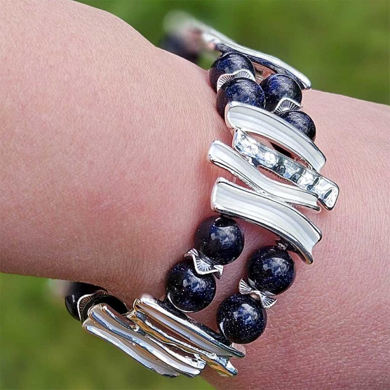 Blue Goldstone statement cuff bracelet with starry-night sparkle. A bold handmade gift for her for birthdays, Christmas, anniversaries and special occasions.