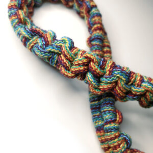 Handmade macrame fringe shoulder bag Ireland colourful cotton cord boho style with braided strap and bead detail