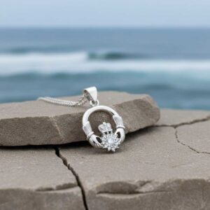 Irish Claddagh pendant necklace in sterling silver with clear CZ. Hallmarked in Dublin Castle, perfect gift for communion, confirmation, birthdays & everyday wear. Ships from Ireland via tracked An Post.