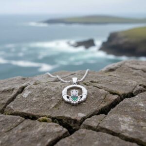 Sterling silver Claddagh pendant with emerald CZ, hallmarked in Dublin. A meaningful Irish Galway gift symbolising love, loyalty & friendship – ideal for communion, confirmation & birthdays.